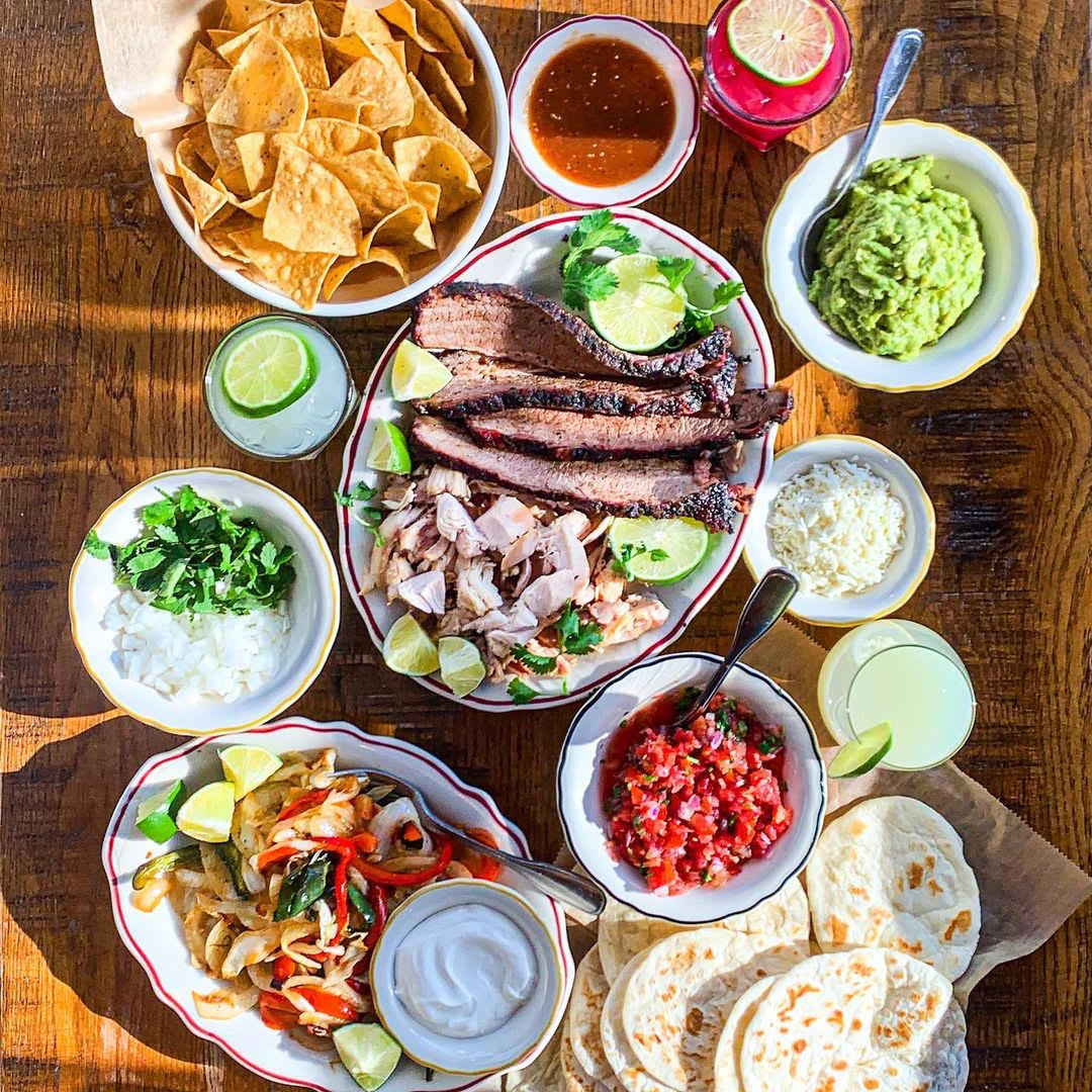 many different types of food on a table many different types of food on a table